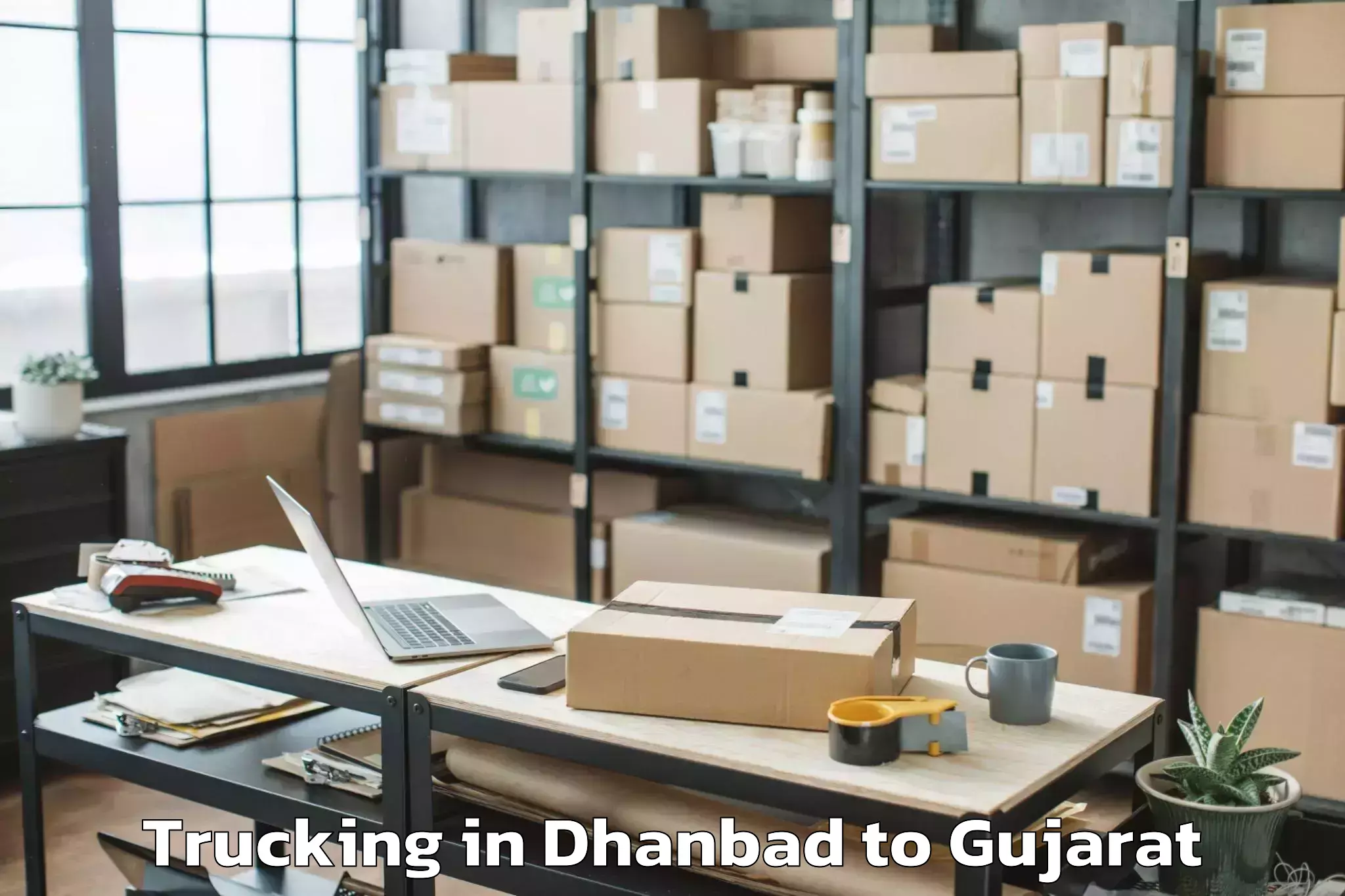 Trusted Dhanbad to Kaprada Trucking